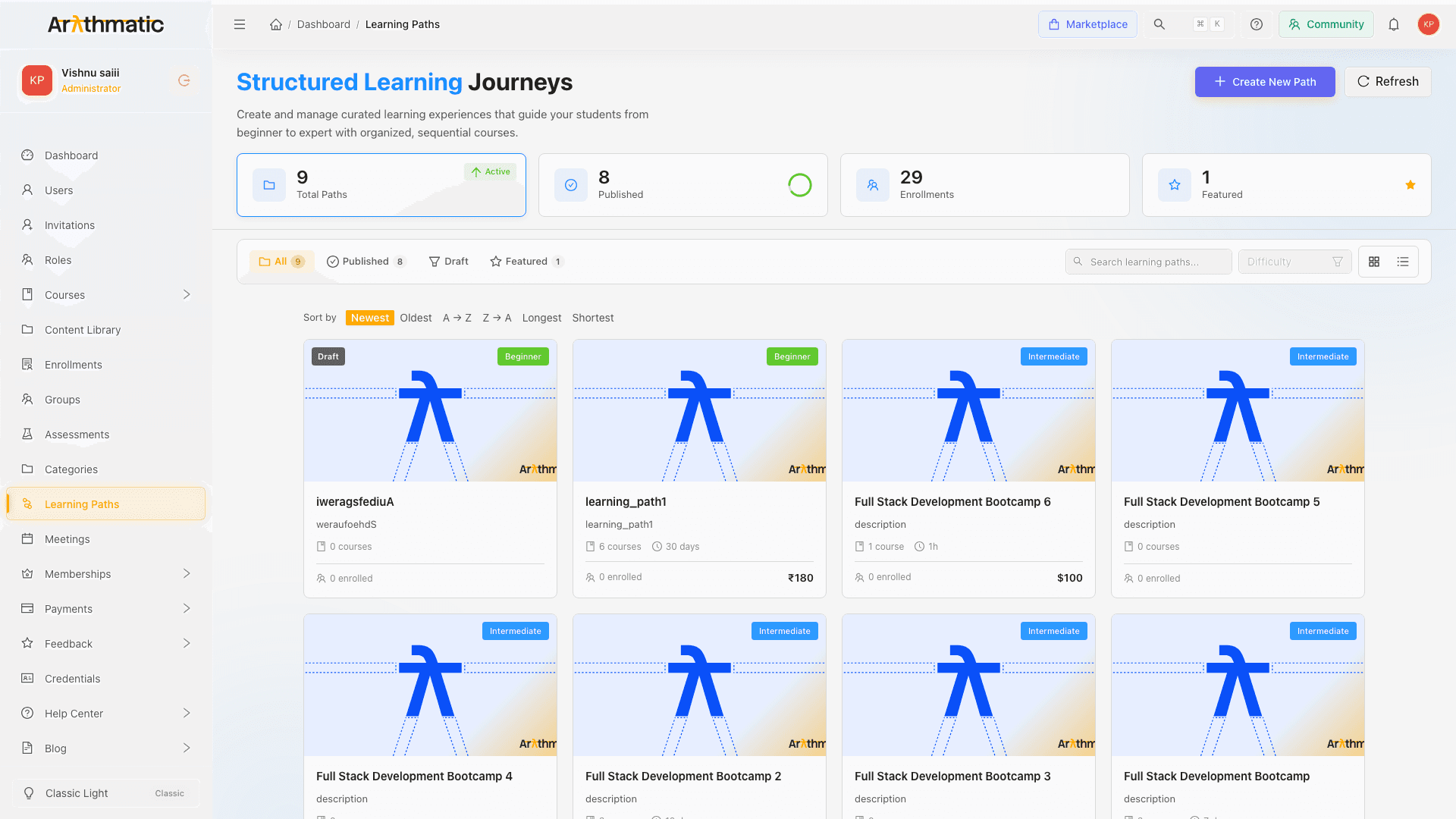 Learning Paths list page showing path cards with stats